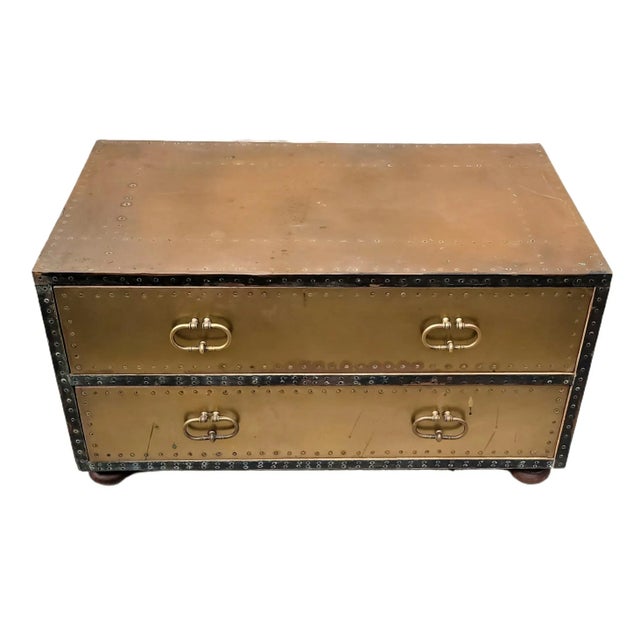 Featured is a beautifully patinated Vintage Sarreid Brass Cocktail Table Chest of Drawers. A very nice Hollywood Regency...