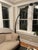 Arc floor lamp from Sweden made of a round Carrara marble base, black metal central stem, and five adjustable arms of...