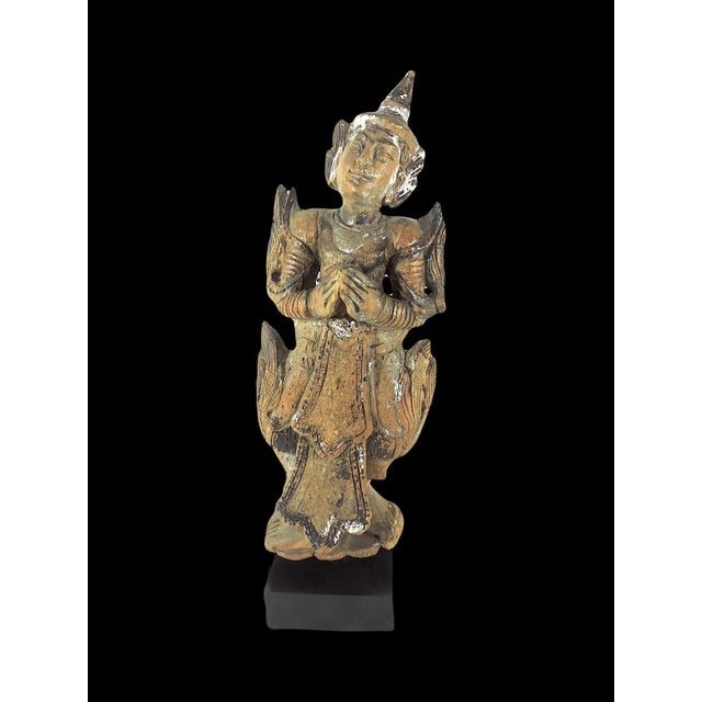 Very old Thai statue professionally mounted and pinned on a black base. These temple angels and protectors are generally...