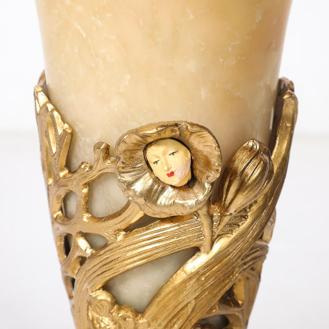 This elegant Pair of Art Deco Gilt Bronze & Alabaster Table Lamps on Polished Brass Bases originated in France, circa...