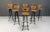 Vintage brutalist bar stools with elegant wrought iron bases and wooden seats and backrests. These bar stools are very...