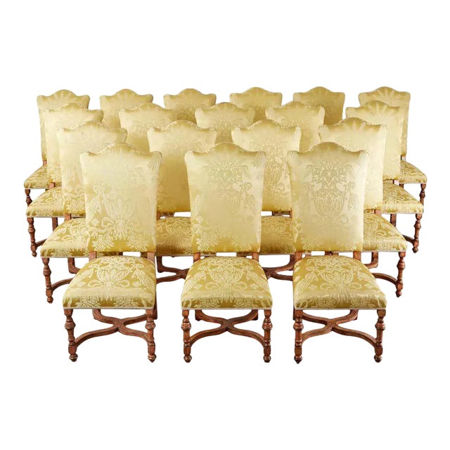 Magnificent dining chairs made in the French Louis XIII and French Louis XIV transitional taste. Featuring a dramatic...