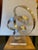 Dan Murphy Aluminum Sculpture. Curly Twisting bands of aluminum form a sculpture that sits on a lucite base. Signature to...