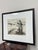 Design Plus Gallery presents a Sickle Reaper Drawing in Charcoal. The framed piece is a landscape view of a laborer...