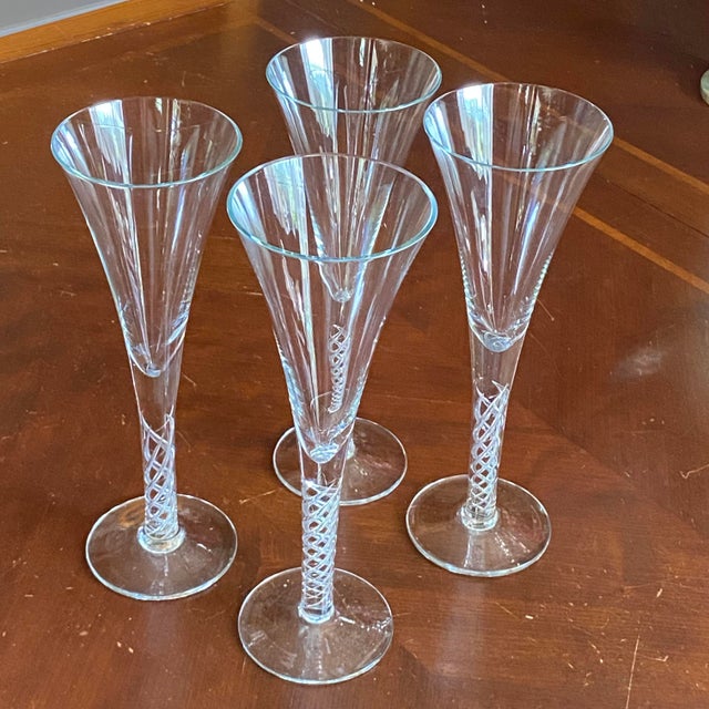 Wonderful set of 4 wine//champagne glasses with air twist stems by Colony. These glasses are really cool.