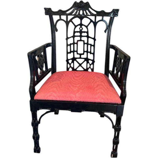 In stock ready for immediate shipping. Pair of 1960s chinoiserie armchairs featuring pierced pagoda-style backrests, faux...