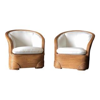A Pair of Ficks Reed Club Chairs For Sale