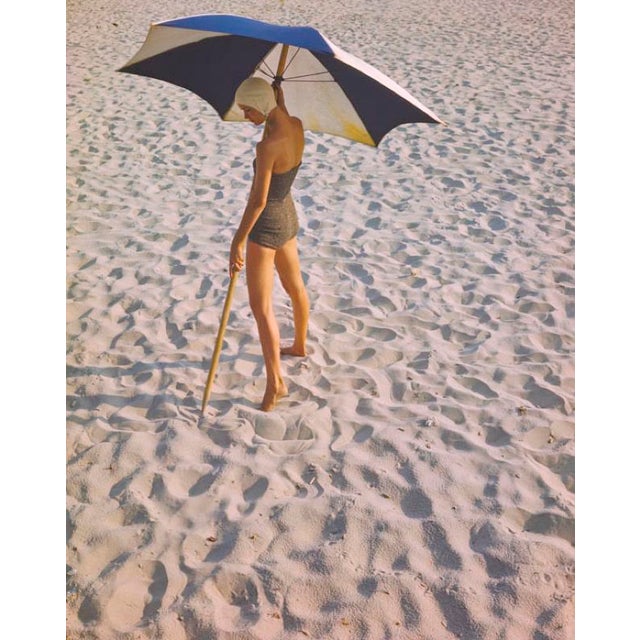 Girl On The Beach by Toni Frissell Beachwear fashion shoot featuring sunshades, 1948. (Photo by Toni Frissell) 16x12"...