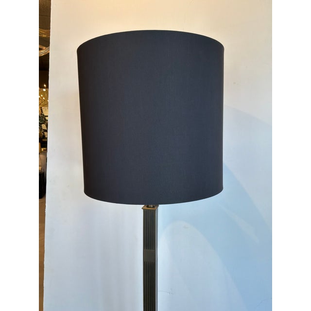 Theodore Alexander Modern Bronze Floor Lamp. Black cylinder shade with rectangular bronze body on black base. Showroom...
