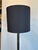 Theodore Alexander Modern Bronze Floor Lamp. Black cylinder shade with rectangular bronze body on black base. Showroom...