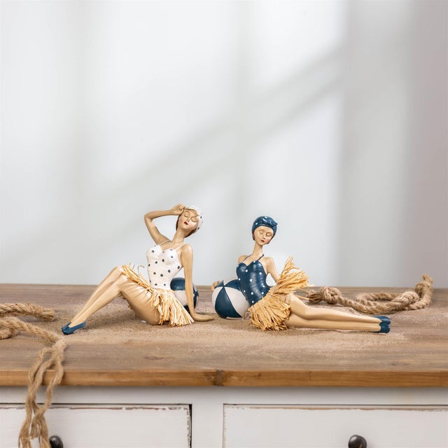 Bring vintage seaside charm to your space with this playful Retro Beach Babe figurine set. Inspired by classic 1950s swim...