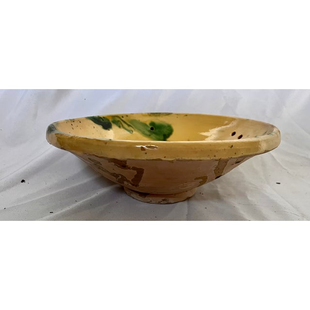 Imported from France. Late 1800s hand painted terra cotta glazed berry bowl. A useful kitchen item as well as a work of...