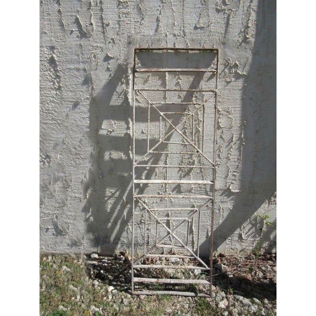 A piece of architectural salvage from an iron gate. Heavy and sturdy. Piece does show signs of age related wear including...