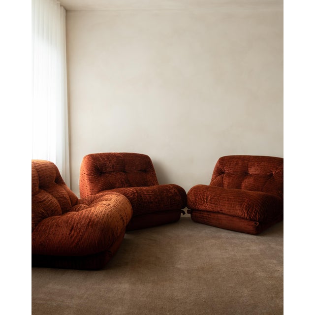 A vintage italian nuvolone modular sofa in rich rust-toned textured upholstery, designed by rino maturi for mimo padova...