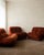 A vintage italian nuvolone modular sofa in rich rust-toned textured upholstery, designed by rino maturi for mimo padova...