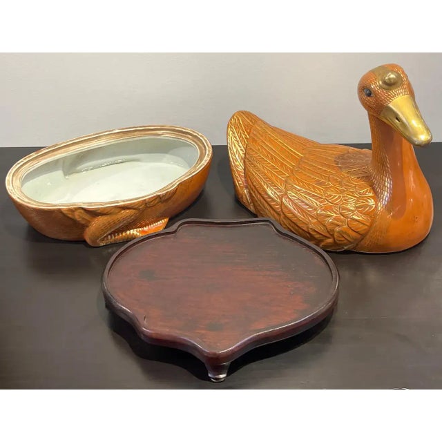 Chinese Export Porcelain figural iron red and gilt duck tureen & stand Later 20th century Of large size, realistically...
