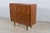 Teak dresser with five drawers, produced in the 1960s in Denmark. There is a fold-out mirror in the third drawer. A chest...