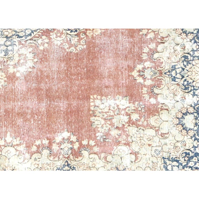 This Vintage Persian Kerman Rug, handcrafted in the Kerman region of Iran, has been expertly distressed and refinished in...