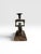 A striking vintage figural monkey candlestick featuring a beautifully sculpted primate kneeling while supporting an...