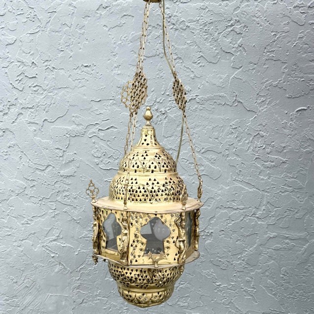 The 3 chains attached are 18” long and the chain to the fixture is 42” This vintage Middle Eastern style pendant lamp...