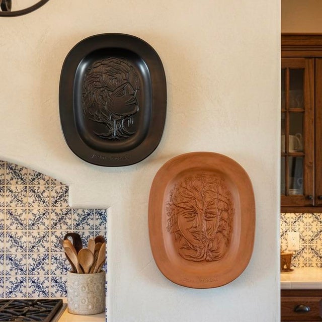 Presented here are two ceramic plates by the late French actor and sculptor, Jean Marais. Both depict Marais' trademark...