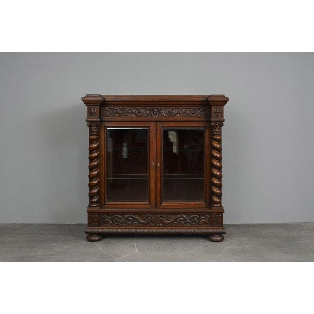 Item: Display Cabinet Period & Style: Historicism – Late 19th Century Features - Decorative and practical piece of...