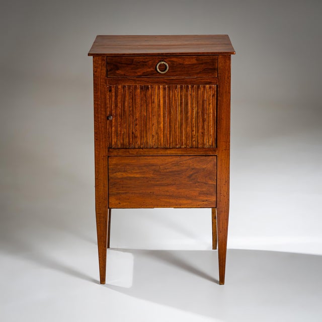 Italian bedside cabinet made from solid and veneered walnut, dating to the late 18th century. Features include a narrow...