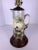 Our antique porcelain stein lamp is an exquisite piece. The painted stein colors will be neutral in any room and it will...