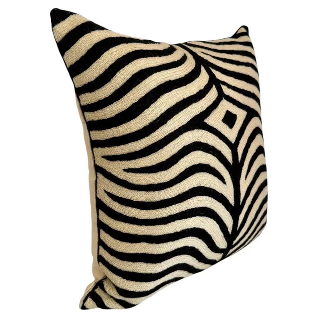 Evoking the refined spirit of Ralph Lauren’s global safari aesthetic, this handmade pillow cover from Kashmir, India...