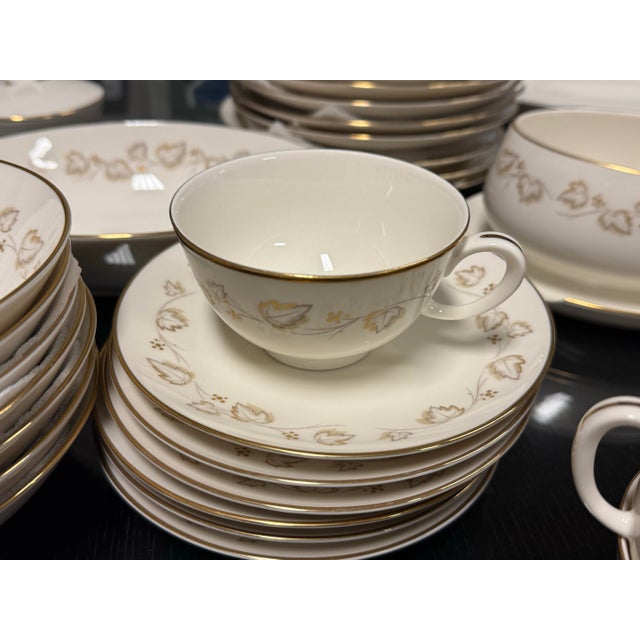 Design Plus Gallery presents a Service for Eight of Noritake China Ivory China. This porcelain dinnerware collection is...