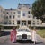 Hotel du Cap-Eden-Roc (1976) Limited Estate Stamped - Giant (Photo by Slim Aarons) Guests standing by a white Rolls-Royce...