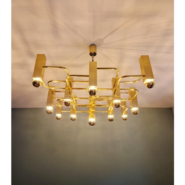 Large brass chandelier, designed by gaetano sciolari for the belgian manufacturer boulanger (model 2213, see catalog...