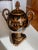 Elegant Timeless Black and Gold Ornate Traditional Grecian Urn, 17" Tall Size: Approx 17”H x 11”W x 9”D Color: Black with...