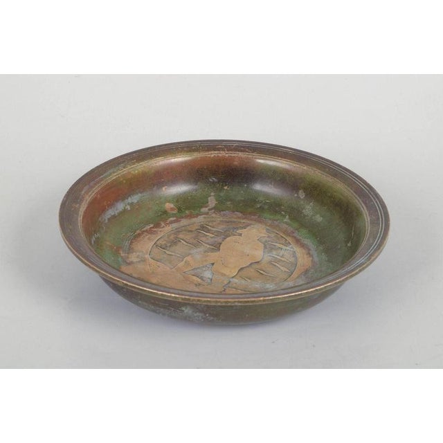 Just andersen, art deco bronze bowl. Round bronze bowl with a profiled rim and figurative relief decoration to the...