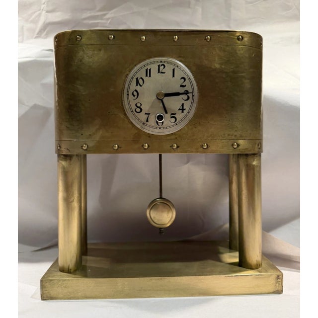 This listing is for an antique German Arts & Crafts portico clock. The clock is made from hammered metal. The upper rests...