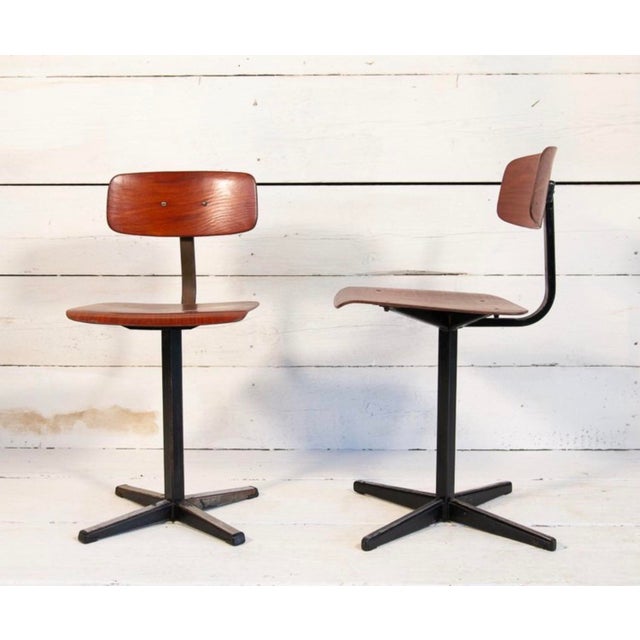 This pair of 1970s school chairs are similar but not identical; the maximum dimensions refer to the larger one. They are...