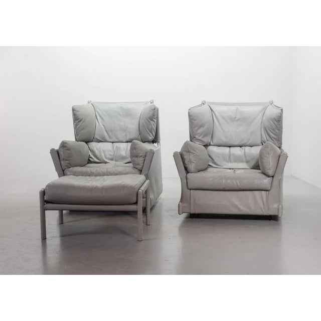 Very exclusive set of two Cassina 'Viola d'Amore' Lounge Chairs with one stool. This piece of art is designed by Piero di...