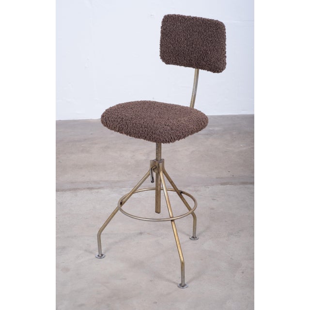 Danish industrial desk or bar chair dating from the 1960s, constructed in metal and newly upholstered in wool. The chair...