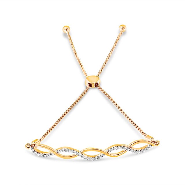 Sure to become an anytime favorite, this layered diamond bolo bracelet is a fashion must. Crafted from weaves of warm 14k...