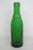This gorgeous bottle that was around in the 1940's and in great condition. This beautiful piece has a lovely green color...