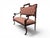 This refined vintage two-seater sofa features a solid, richly carved dark wood frame, reminiscent of a Neoclassical or...