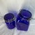 Offered here are vintage cobalt blue glass storage canisters featuring wire bail clamp lids and embossed lettering. One of...