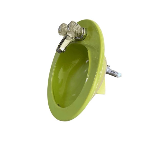 18” sink 8” deep 4” faucet fitting Good condition Unleash a bold splash of retro charm into your bathroom with this...