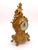 An exceptional antique late 19th-century Gilt Metal Boudoir/Mantel Clock designed in the opulent Louis XV Rococo style....