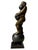 A bronze cast statue titled "On a Roll" by listed artist Michael Bergt of Santa Fe, NM. The statue is typical of Bergts...