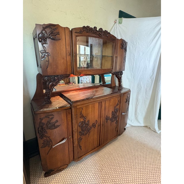 This piece is late 1800 to early 1900 and has beautiful elaborate and whimsical carvings of Foxes, Birds, and Squirrels....