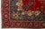 This Vintage Handmade Persian Tabriz Wool Rug in a Rich Red With a Rosette Motif For Sale - Image 9 of 10