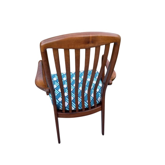 Single armchair. New fabric on seat (I can include enough fabric for one additional chair seat). Original fabric is still...