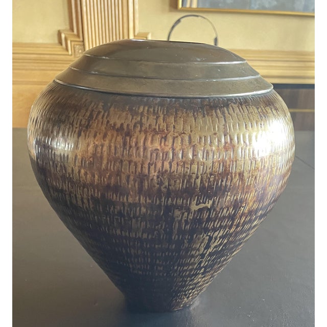 Antique Metal Vase: Measuring approximately 3" in diameter and 10.5" in height.