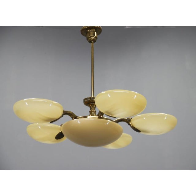 An elegant and authentic Art Nouveau six-light chandelier manufactured by Jenčík, Czechoslovakia, and retaining its...